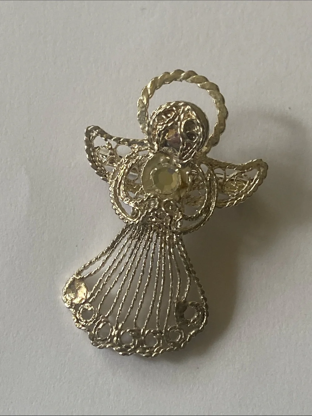 Silver tone vintage angel brooch